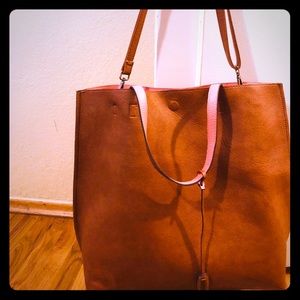 Very large shoulder bag.